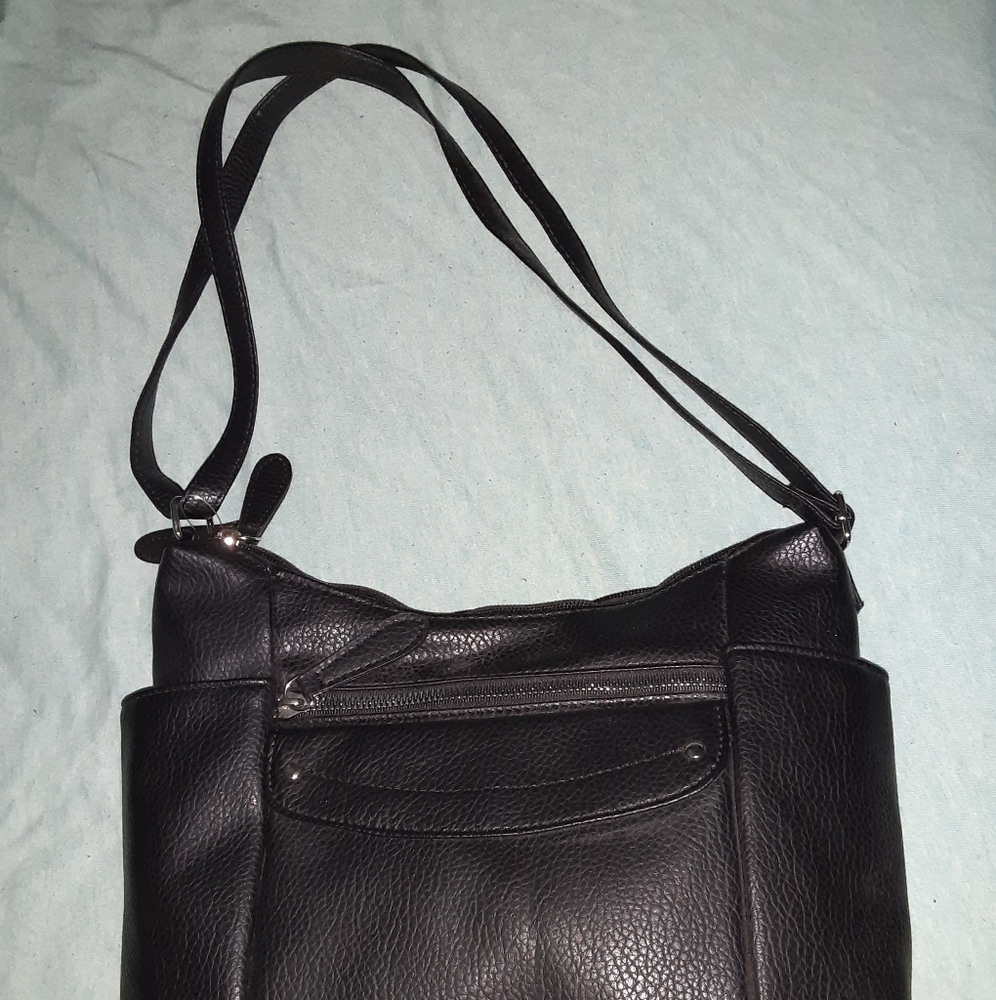 Brand new black purse , never used time and Tru